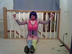 CD Lisa in multiple bondage position (rave outfit)s