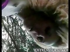 Blond shemale fucks a dude outdoor
